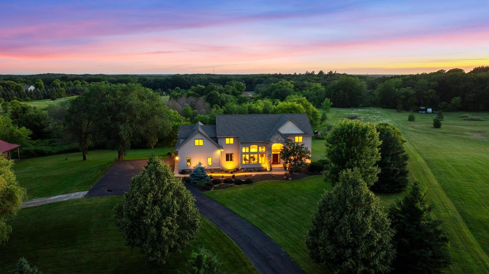 This property is dotted with mature trees, adding an extra level of privacy.