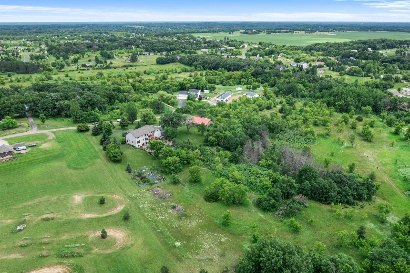 This property includes plenty of wooded space to explore.