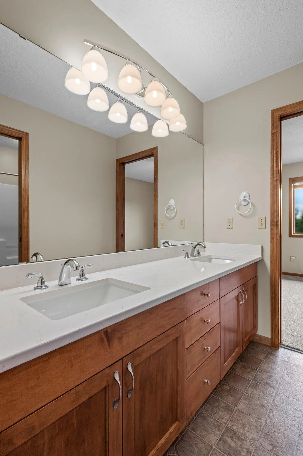 The upper level includes 3 full bathrooms.