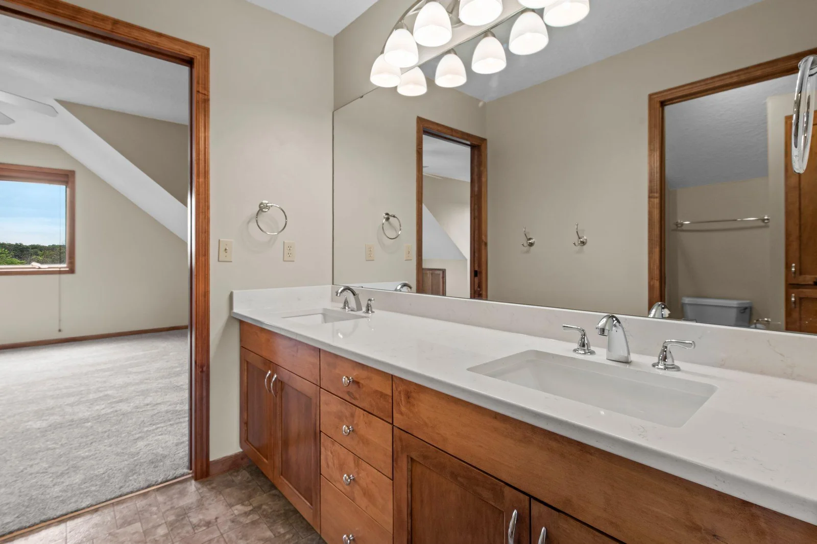 The upper level includes 3 full bathrooms.
