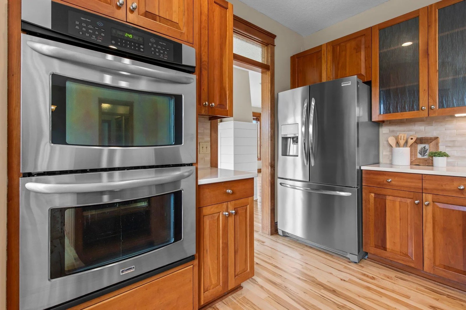 This kitchen is filled with beautiful woodwork.