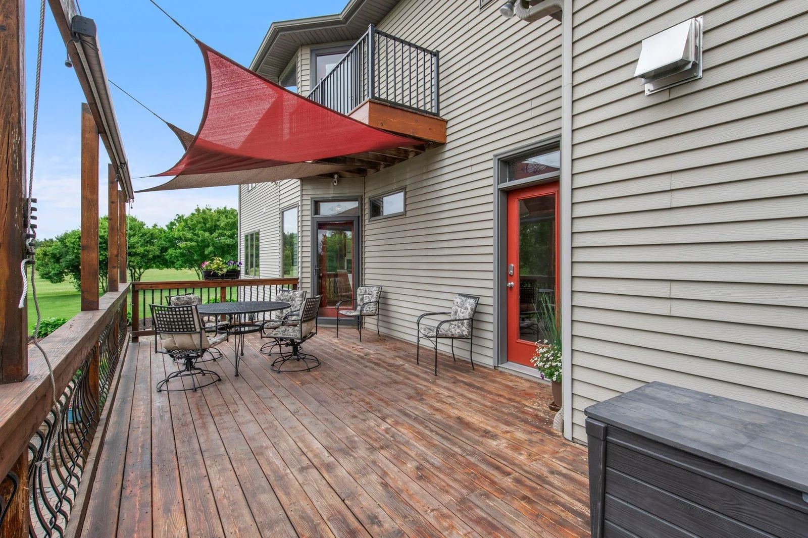 The deck offers plenty of space to enjoy the sun or head down to the pool.