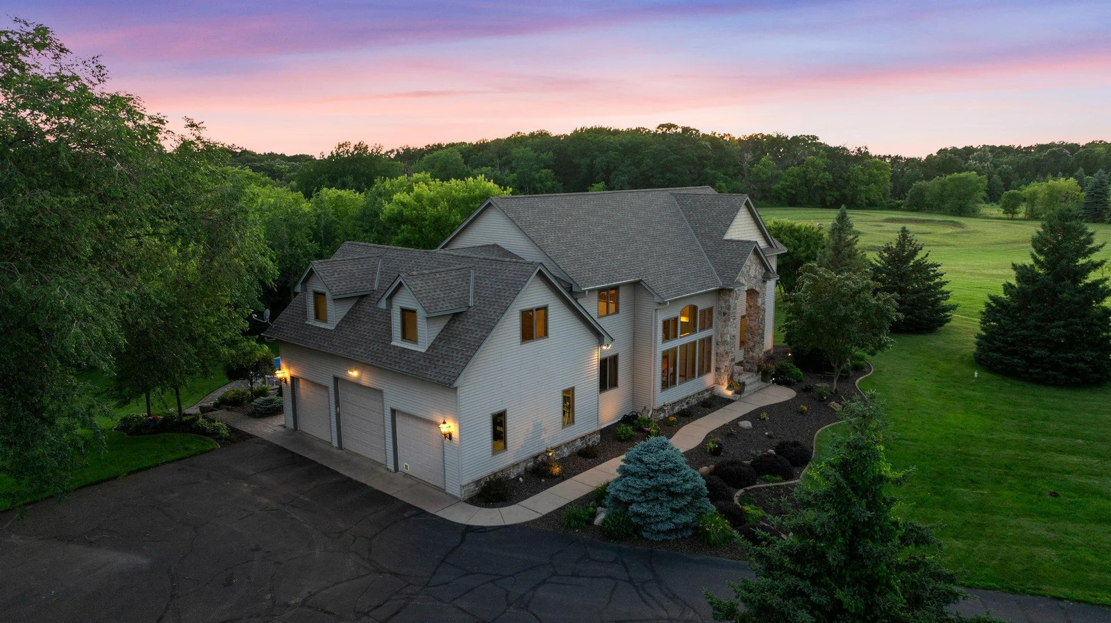 Mature trees dot this property and offer additional privacy.