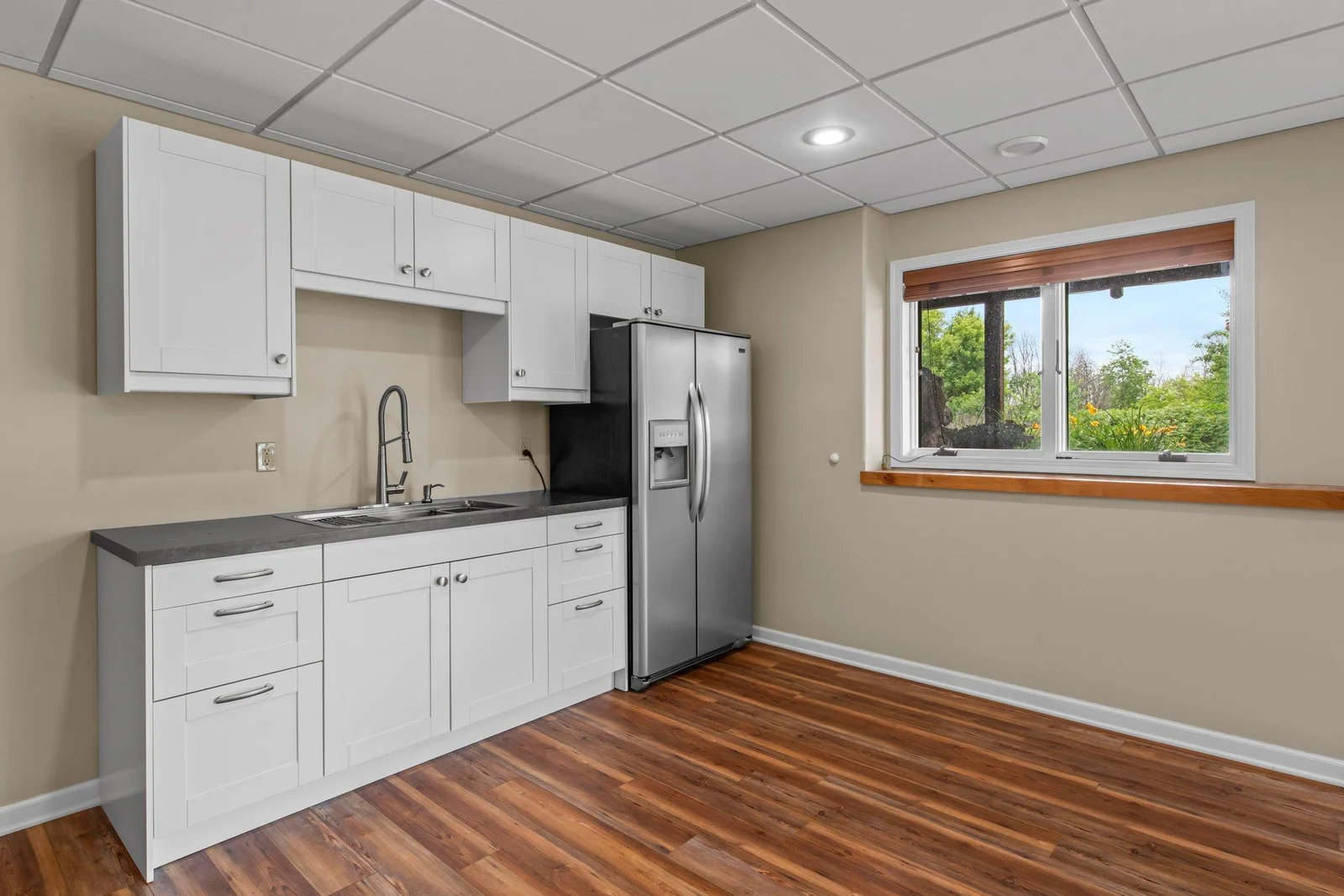 The lower level includes a wet bar, perfect for entertaining.