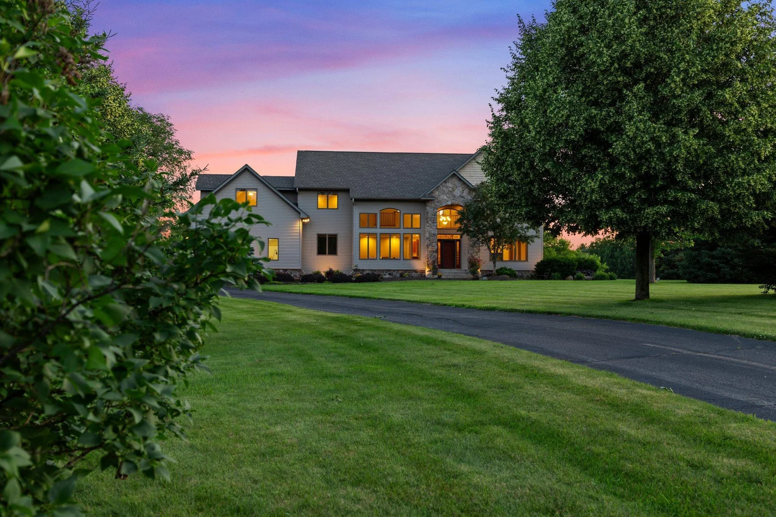 Mature trees dot this property and offer additional privacy.