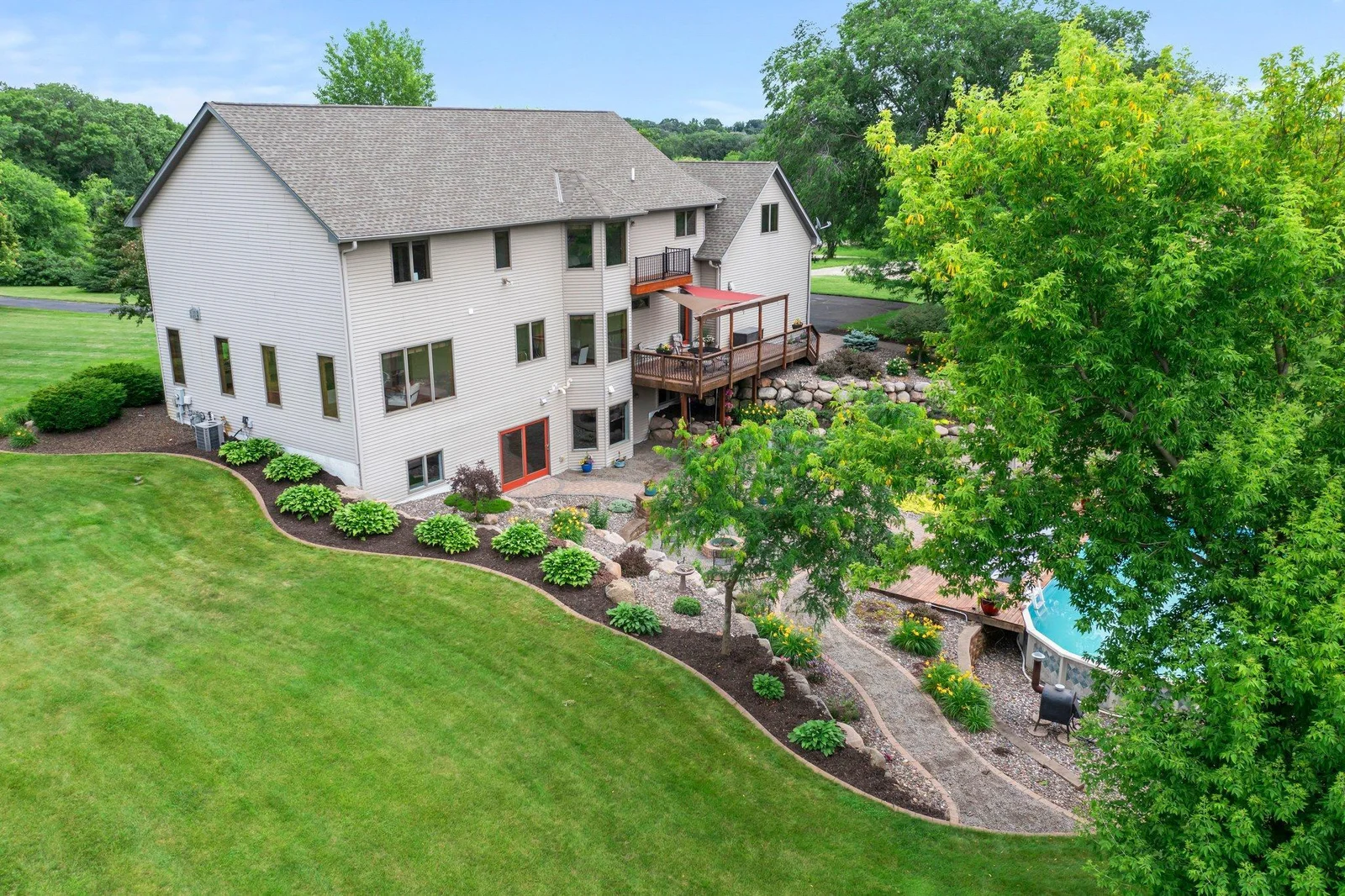 The backyard has been expertly landscaped to create the perfect outdoor space.