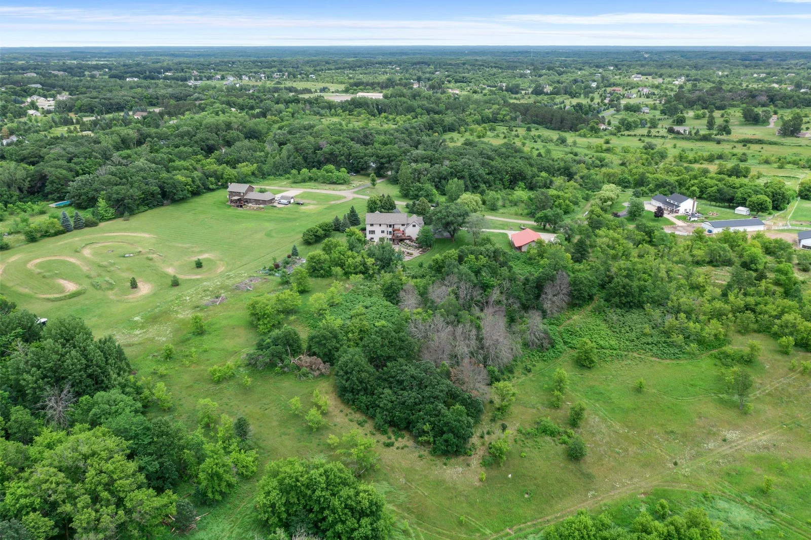 This property includes plenty of wooded space to explore.