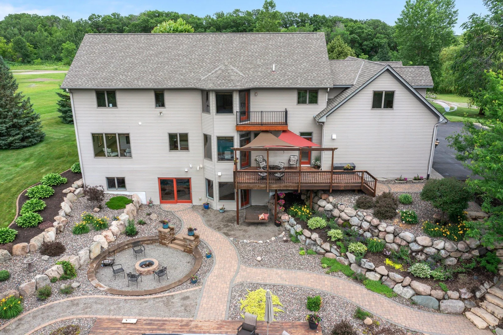 The backyard has been expertly landscaped to create the perfect outdoor space.