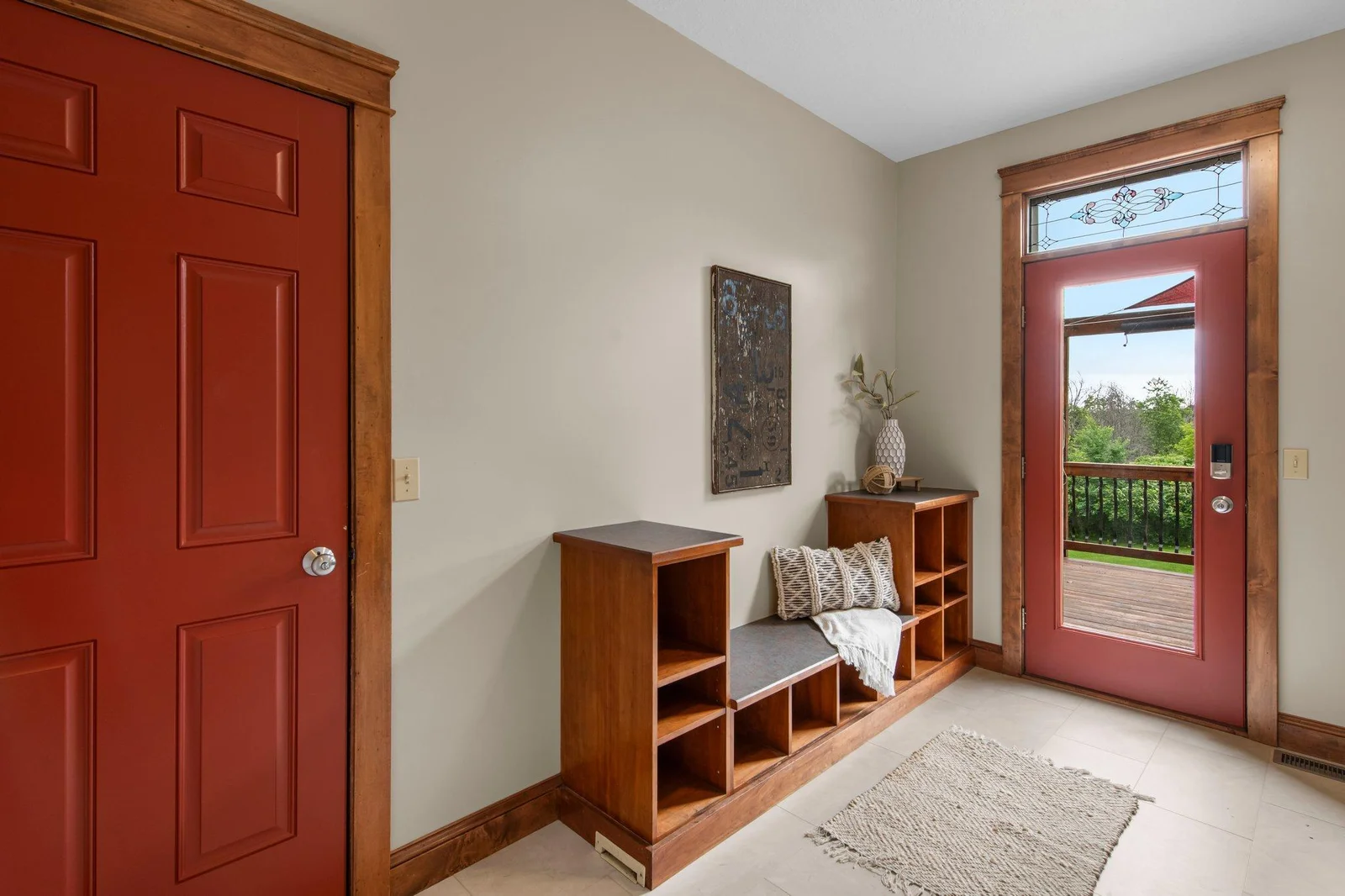 The mudroom is accessible from both the garage and the deck.