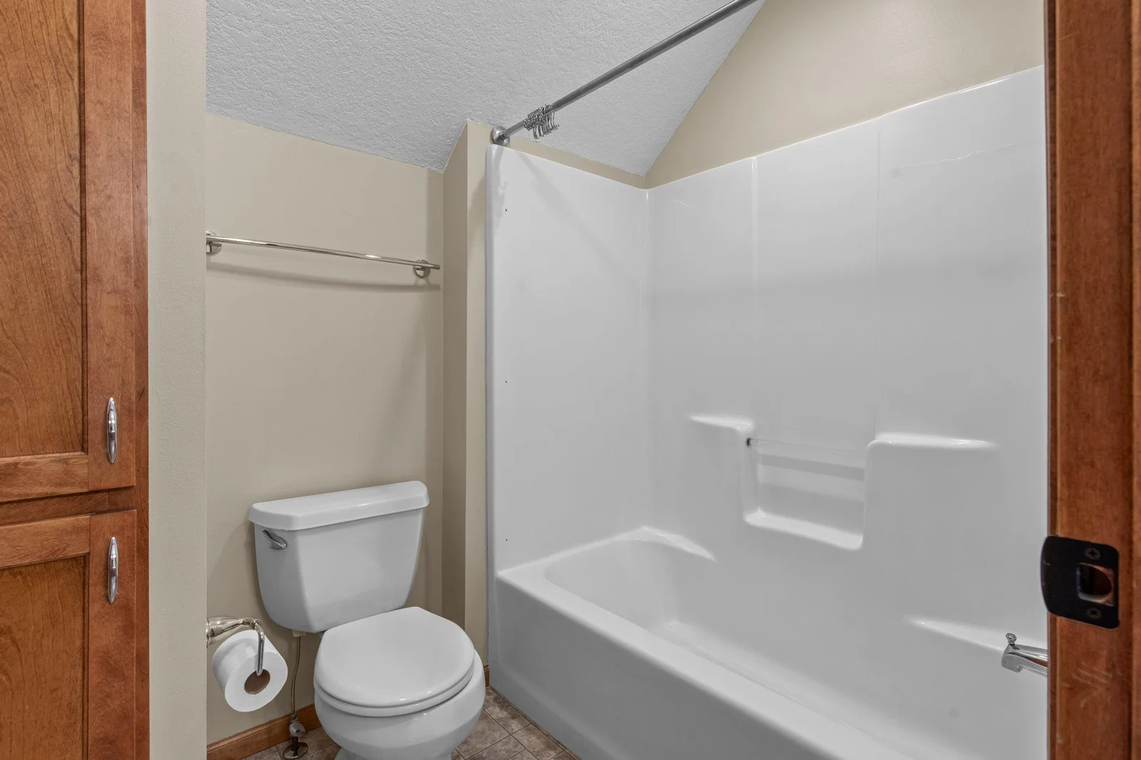 The upper level includes 3 full bathrooms.