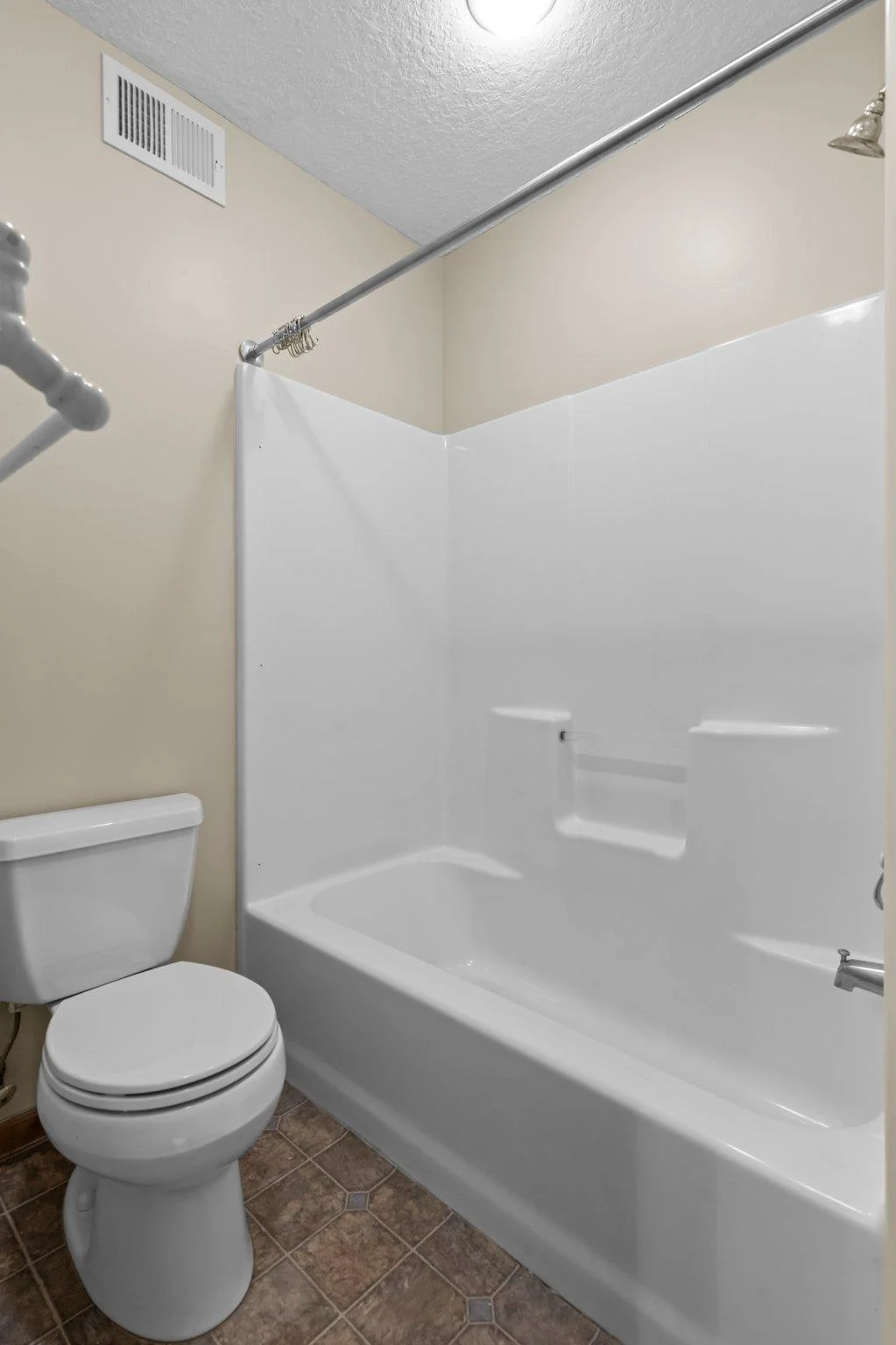 The upper level includes 3 full bathrooms.