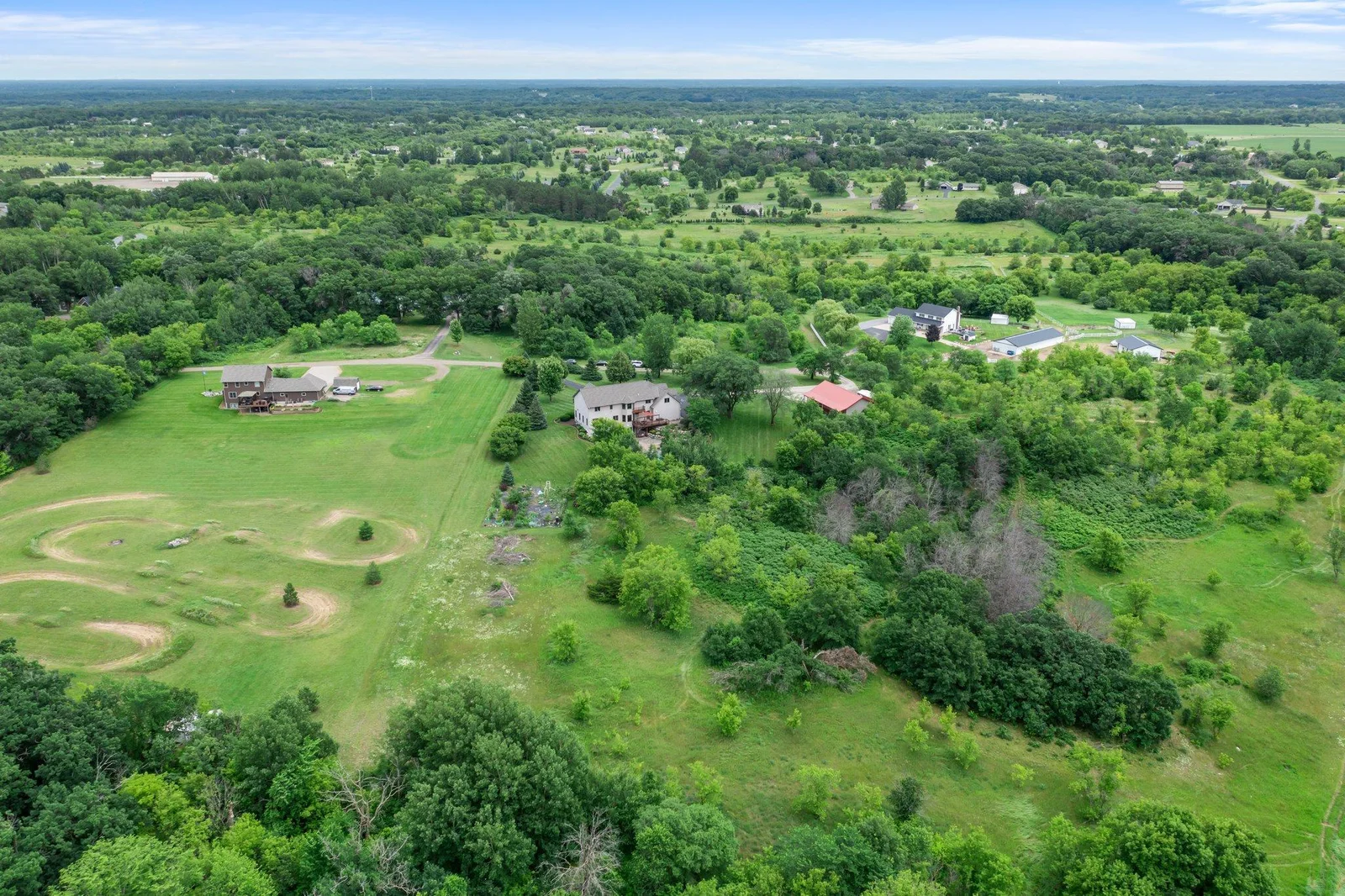 This property includes plenty of wooded space to explore.