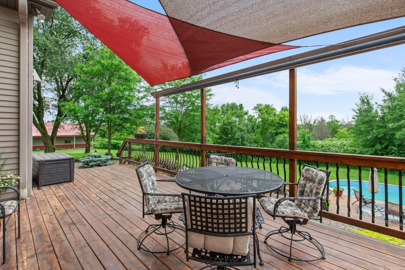 The deck offers plenty of space to enjoy the sun or head down to the pool.