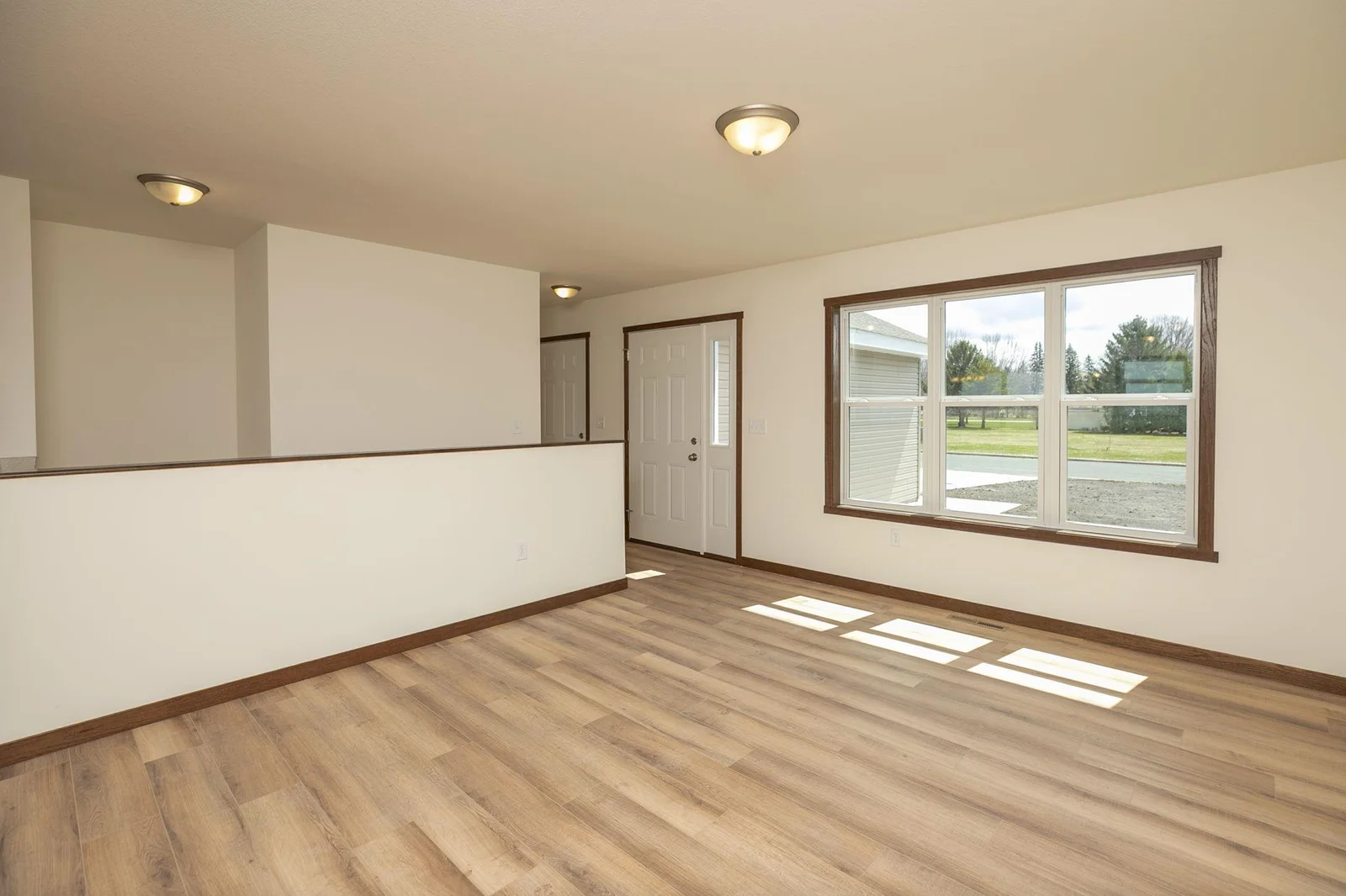 Living Room Abundant Natural Light Main Level..
