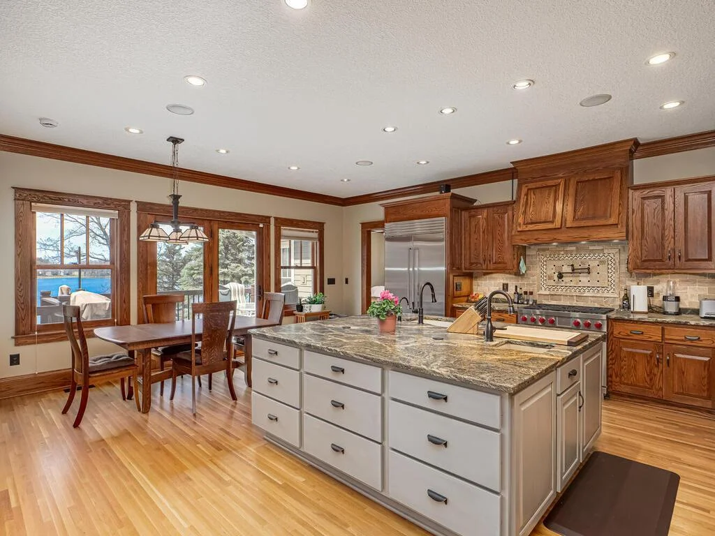 Huge island features 2 sinks, and a German-made Elkay Quartz