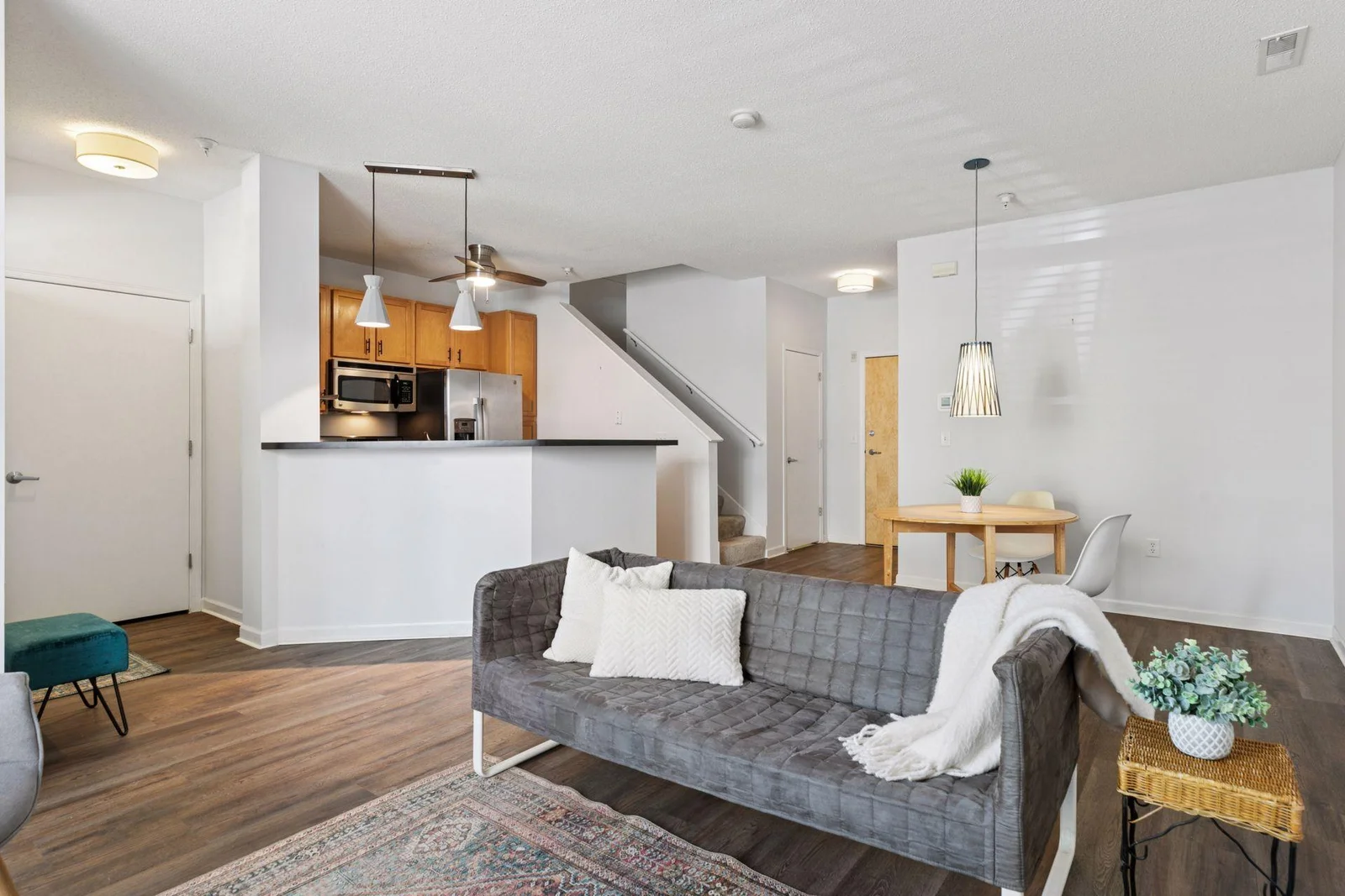 View toward kitchen, stairs and entrance to the home from the main building.