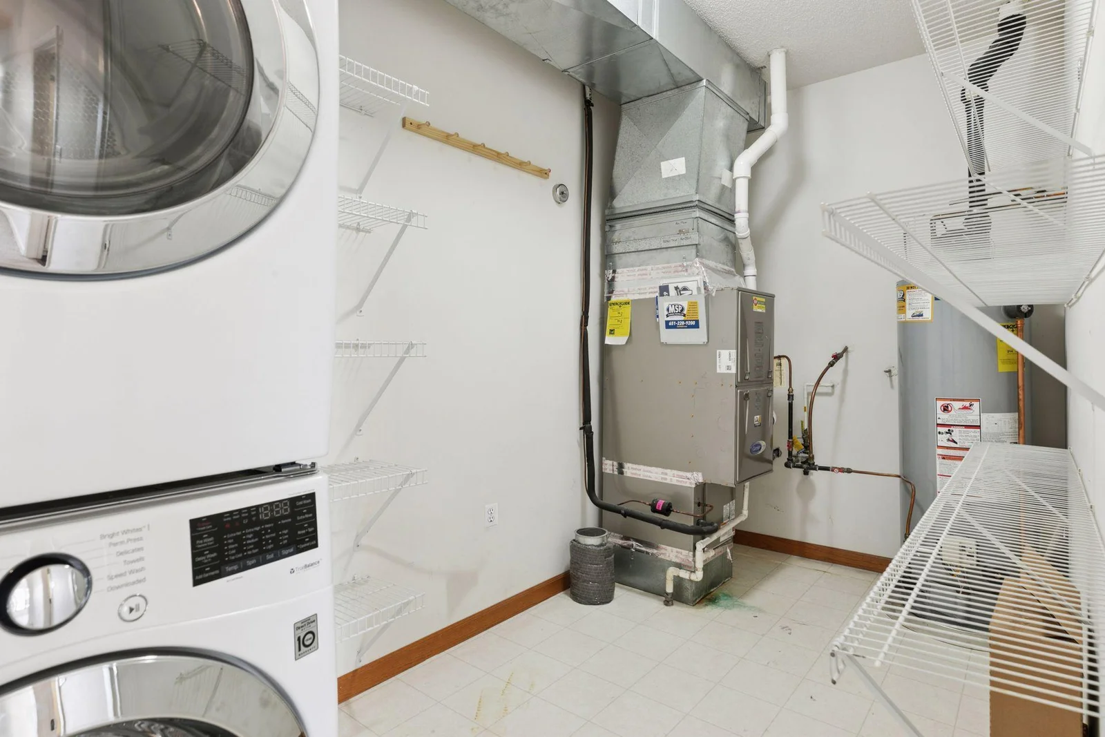 HVAC in laundry room and extra storage.