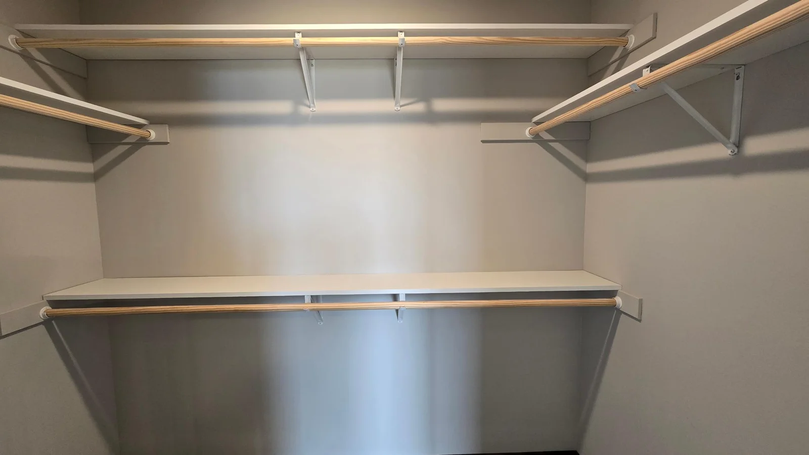 The primary bedroom walk in closet offers double rodding for more storage.
