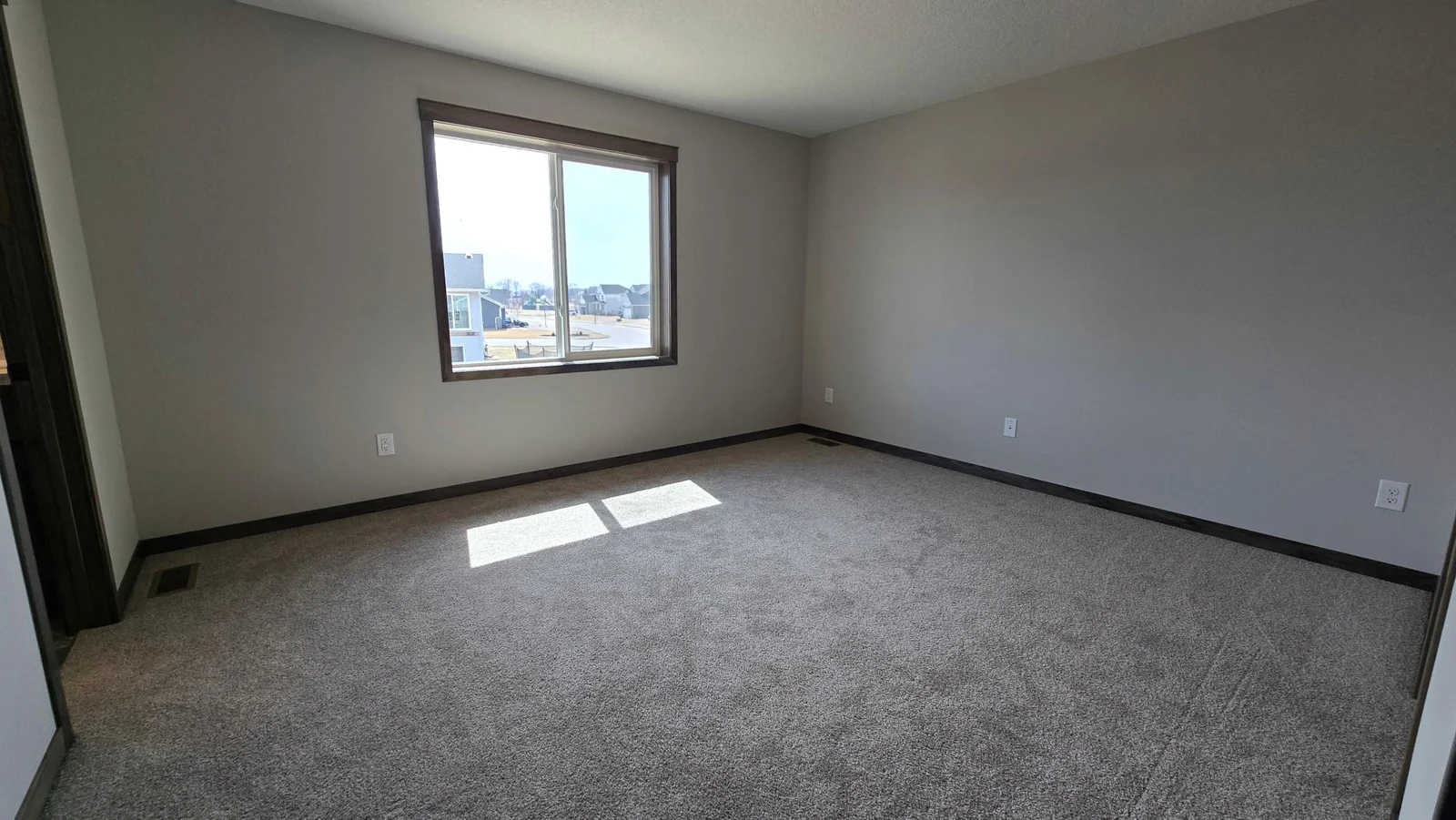 The primary bedroom on the upper level.