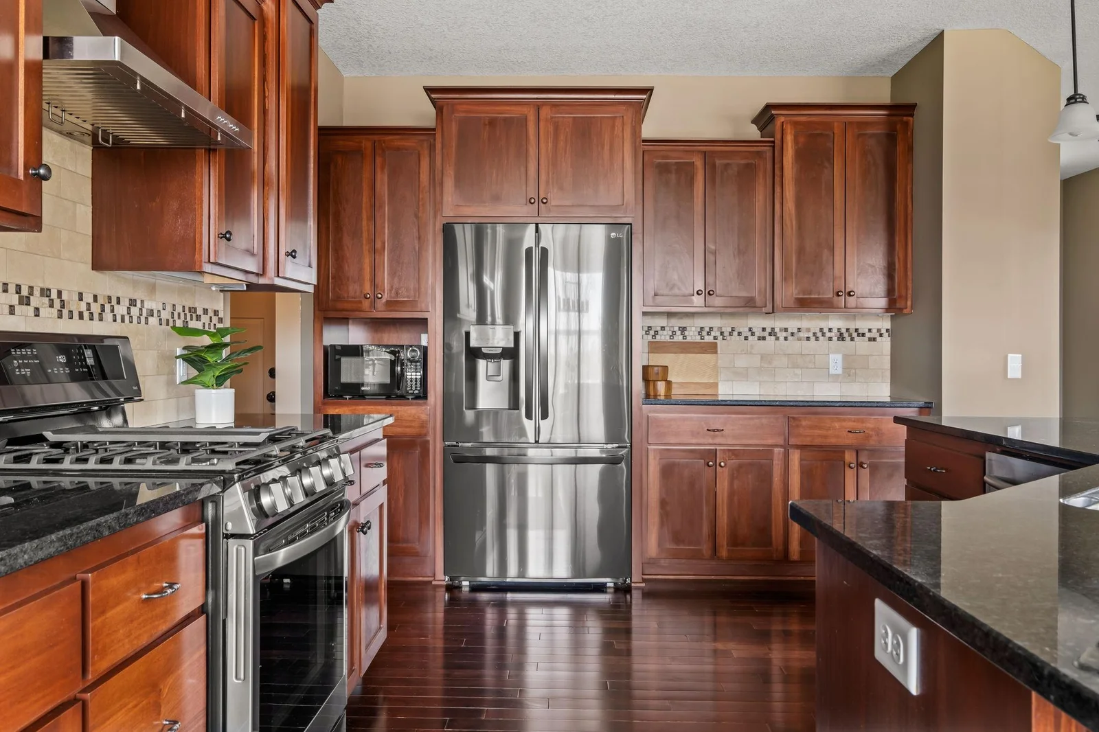 Gorgeous Cabinetry with NEW Black Stainless Appliances
