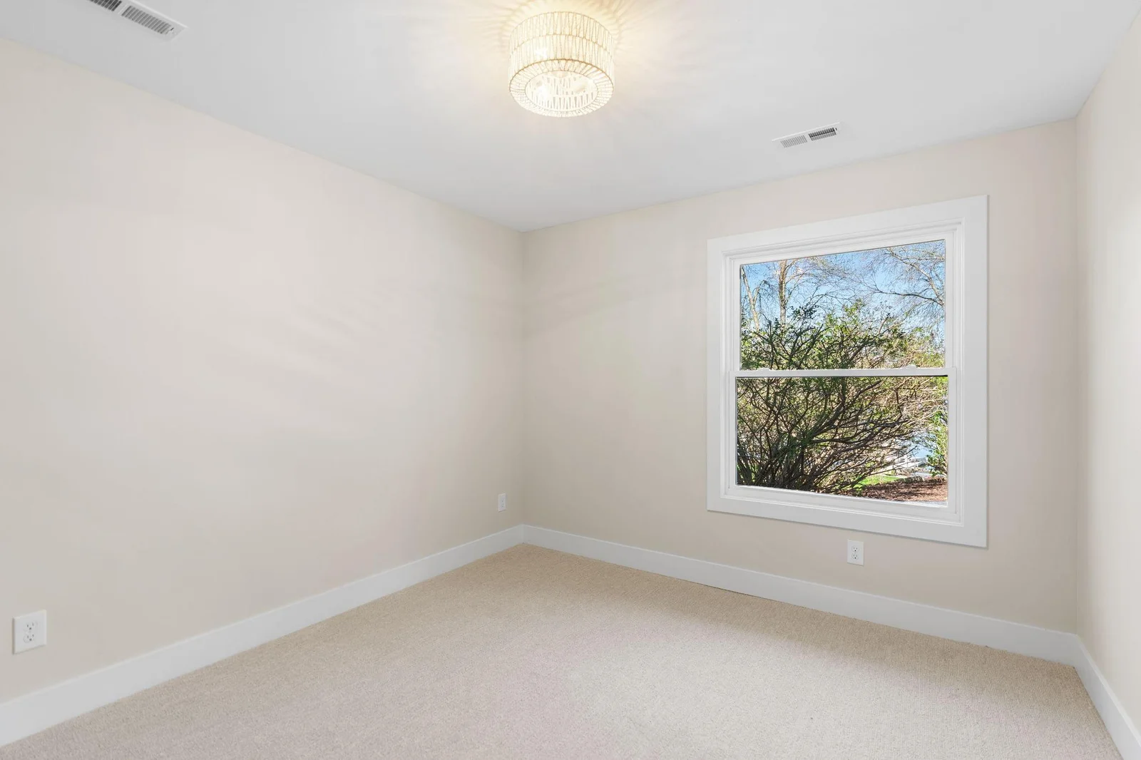 Bedroom 5 features carpeted flooring