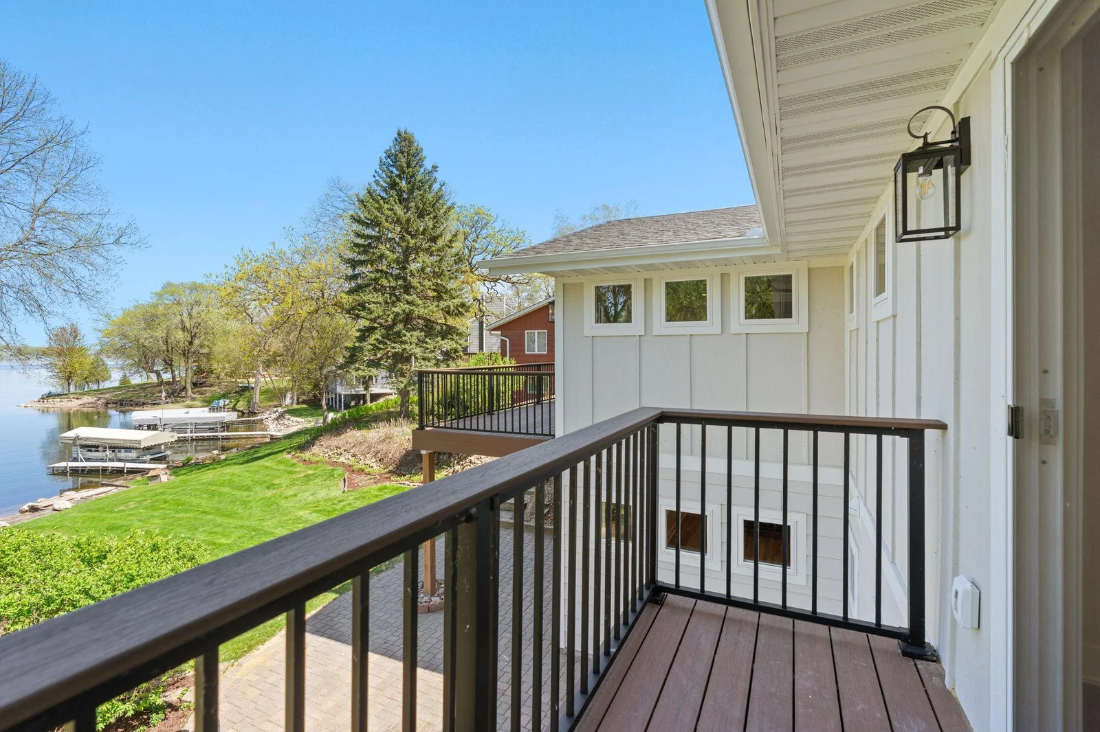 Private balcony off the Master bedroom measures 11 x 4 - maintenance free decking and powder coated railings