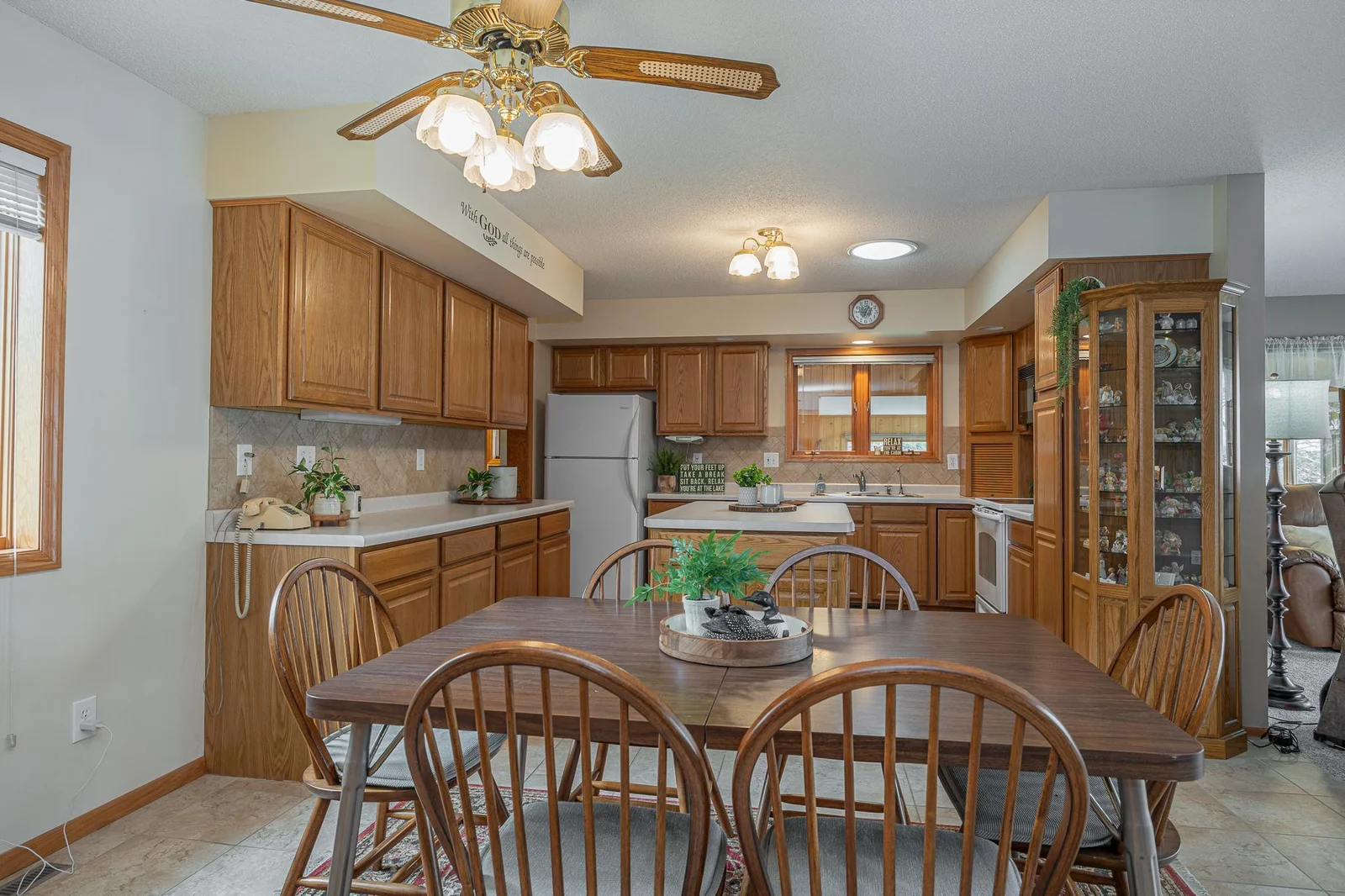 Additional view of kitchen and dining area.