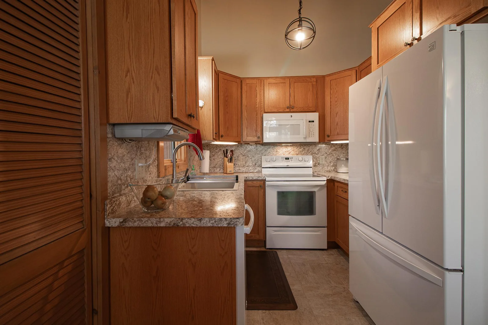 Looking to kitchen from dining area