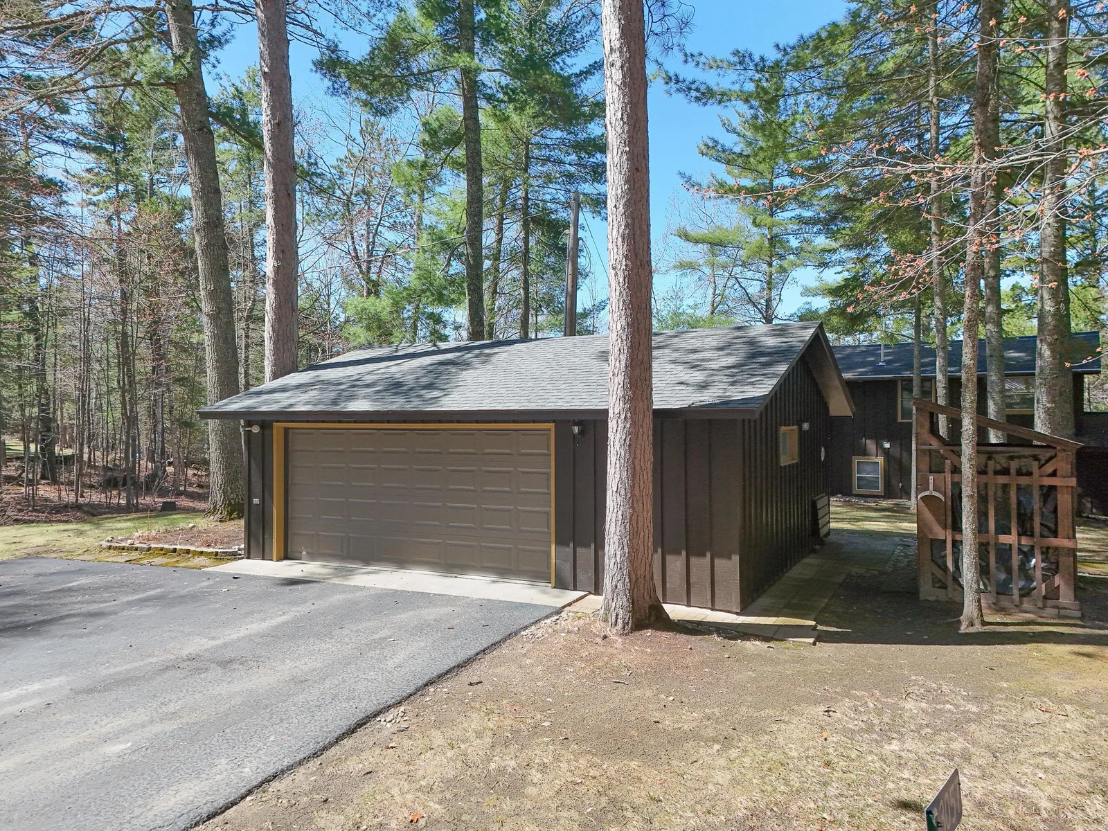 Asphalt extra wide driveway to 26x22 garage