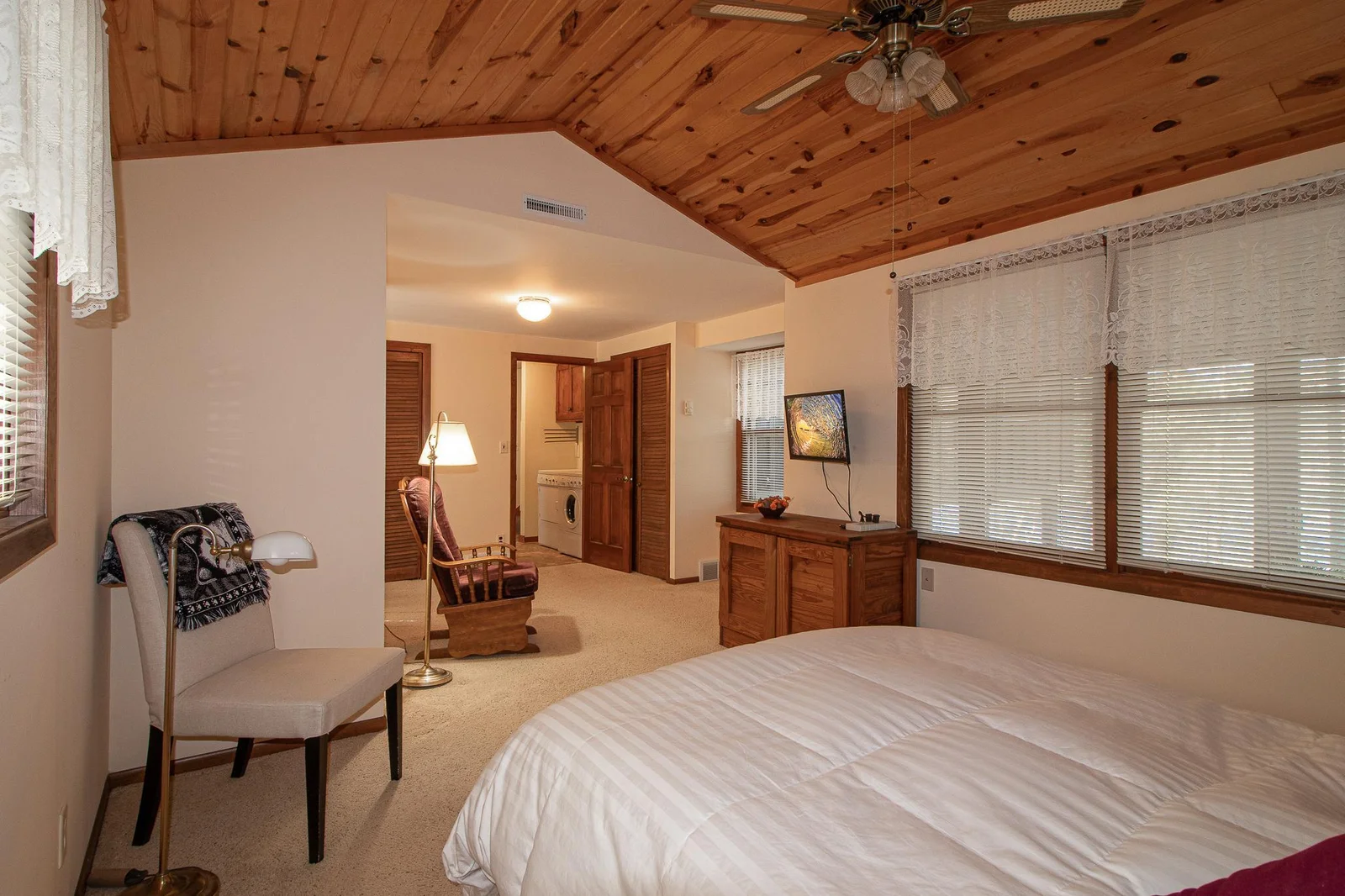Lower 11x22 Bedroom 1 with convenience of laundry off bedroom 1