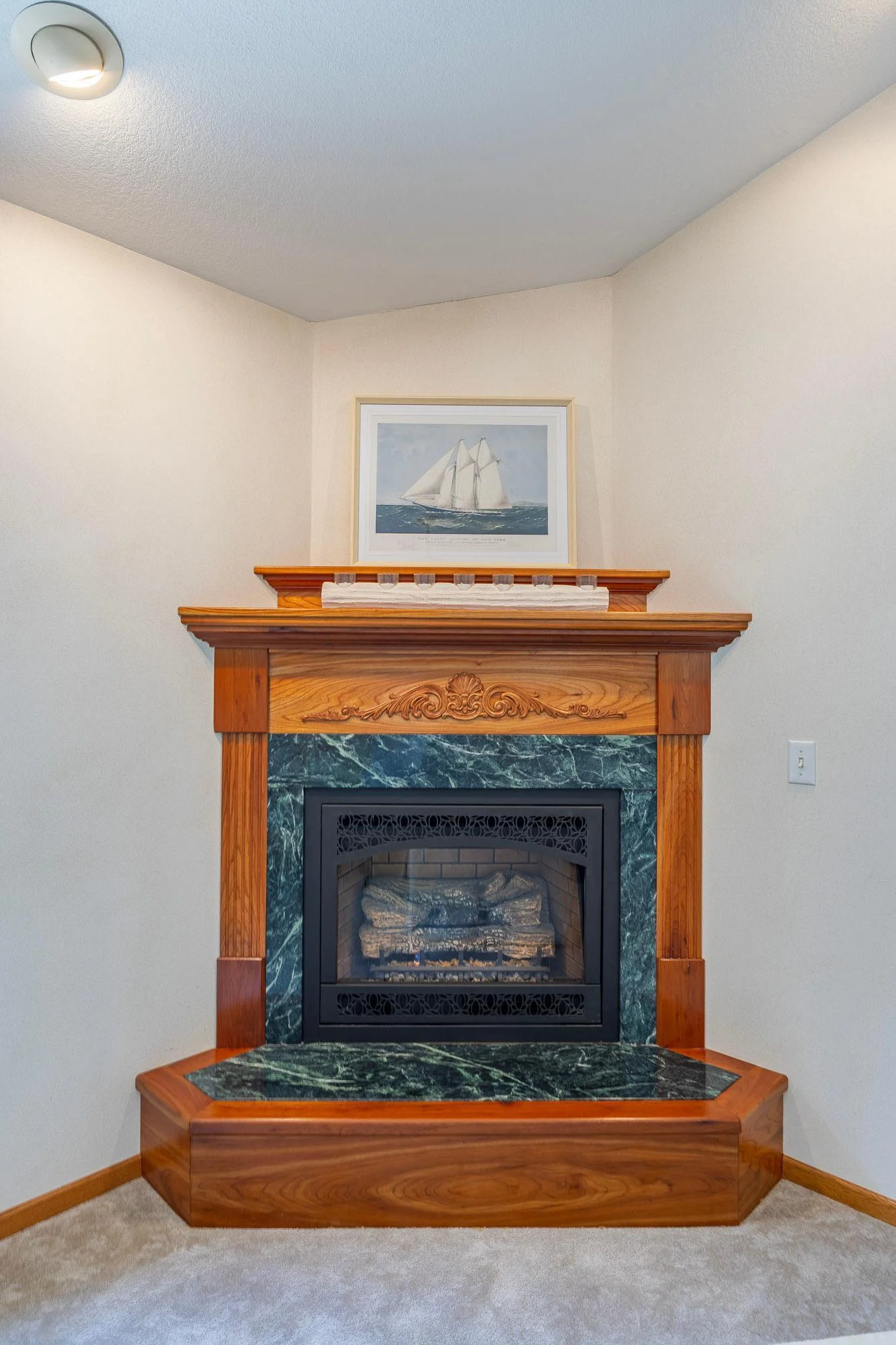 Cozy cherry gas fireplace perfect for cool evenings