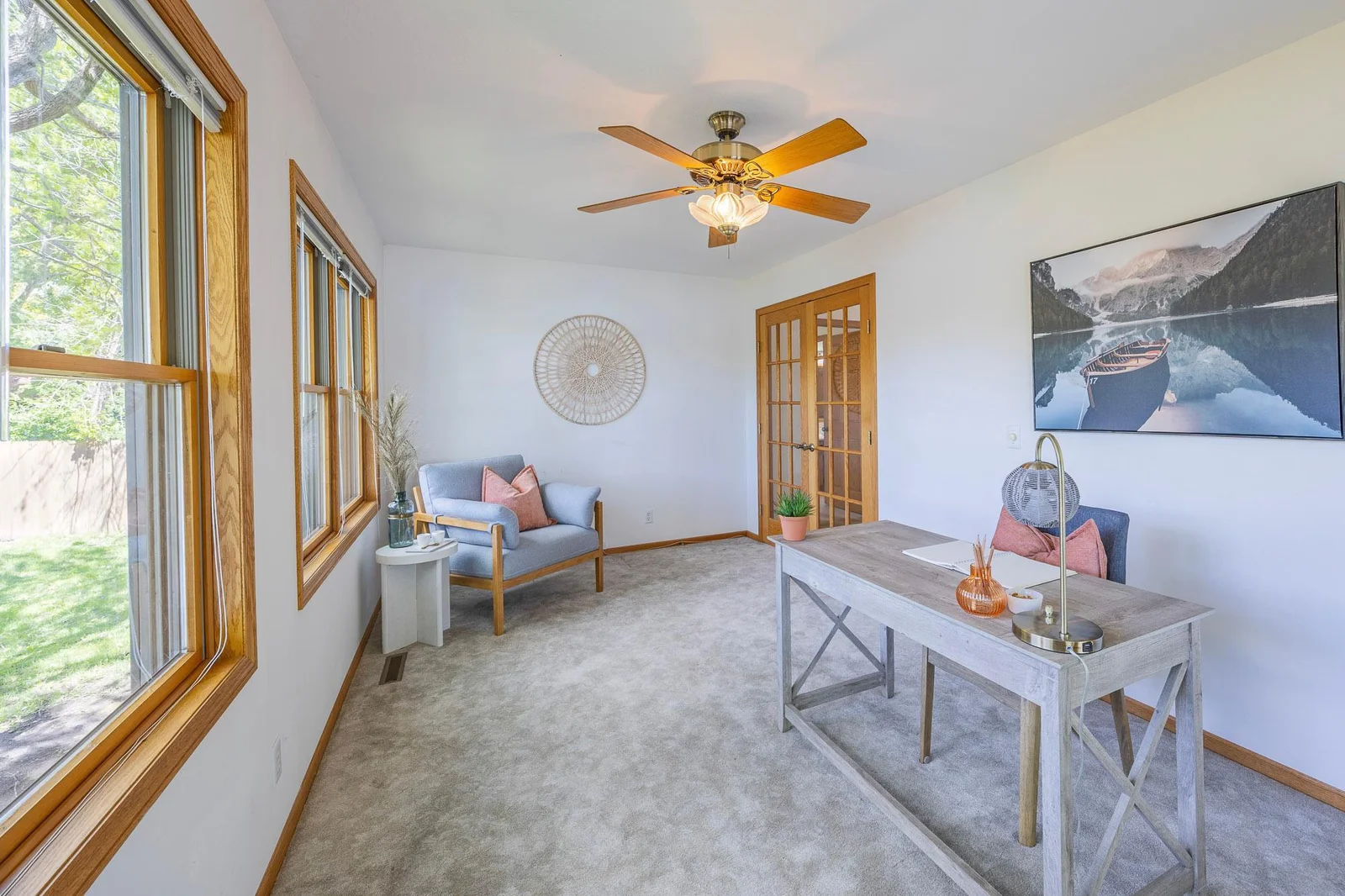 Step into this light-filled sunroom, thoughtfully designed as a versatile home office or relaxation retreat