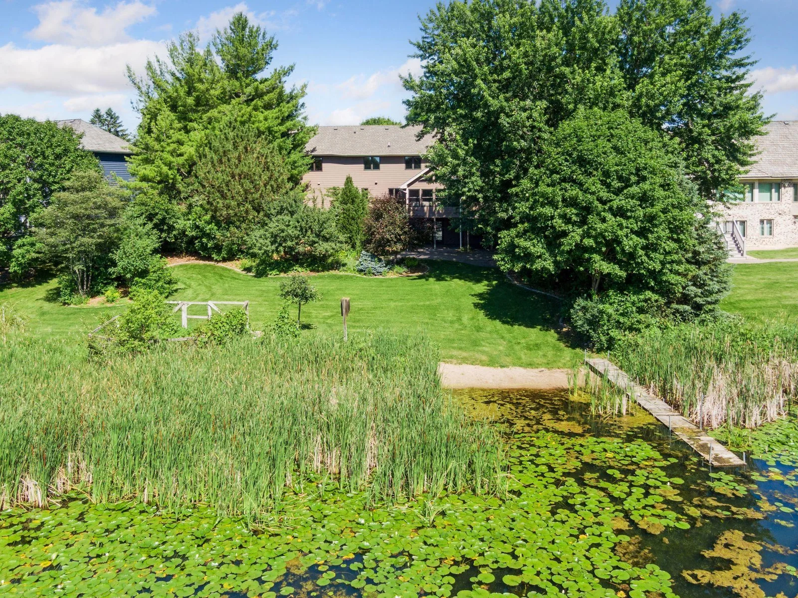 Peaceful and serene setting, dock leads to recreational Lake Edward.   West facing with beautiful sunsets!
