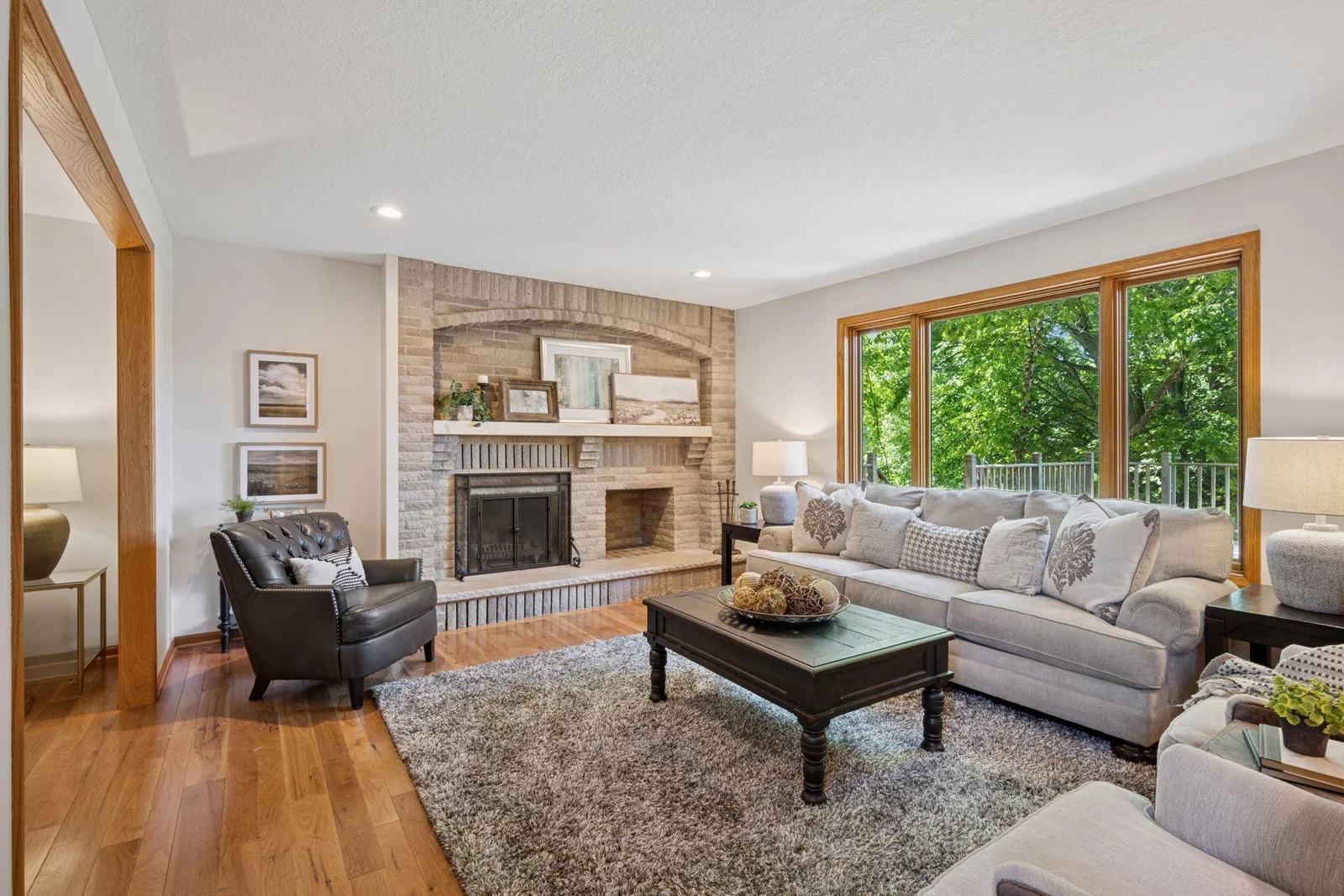 Lovely family home with large spaces and incredible views of private backyard and Lake Edward.