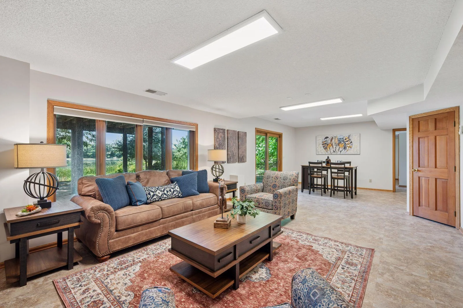 Lower level walk out features large family room with gas fireplace and lots of room for recreation.