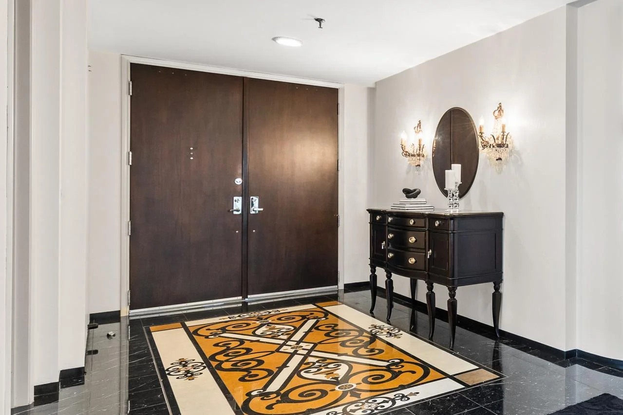 Stunning Foyer with Custom Tiles