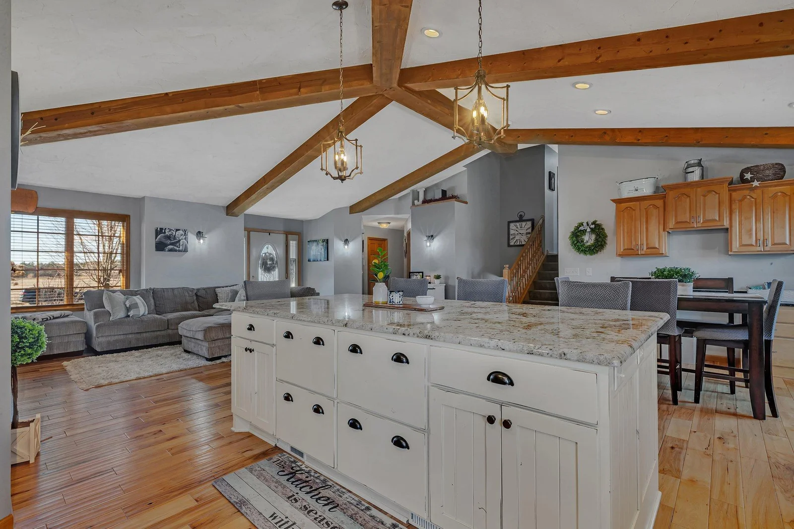 Center island hosts a ton of storage  with custom drawer system.