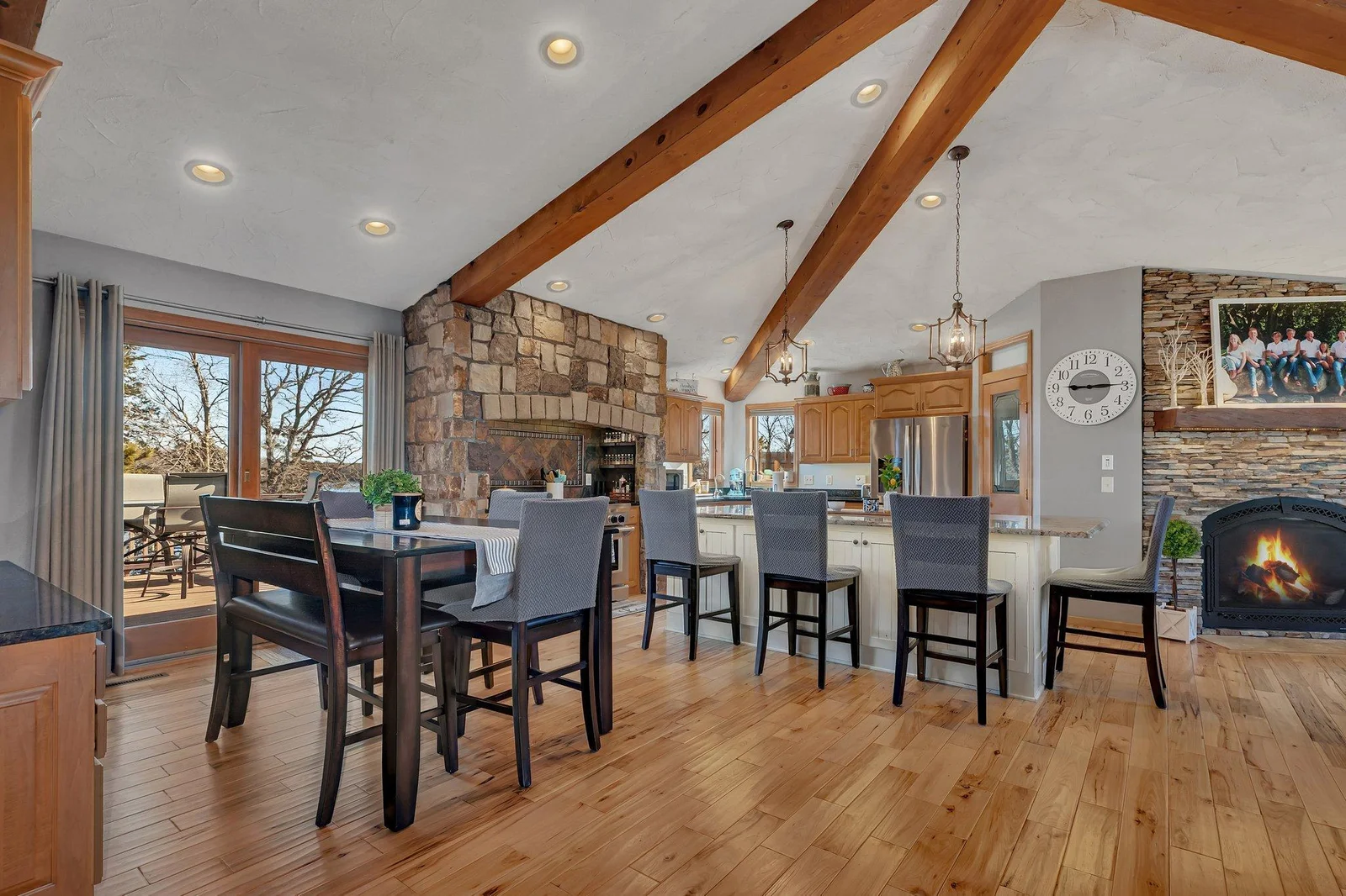Appreciate the exposed beams and hardwood floors.