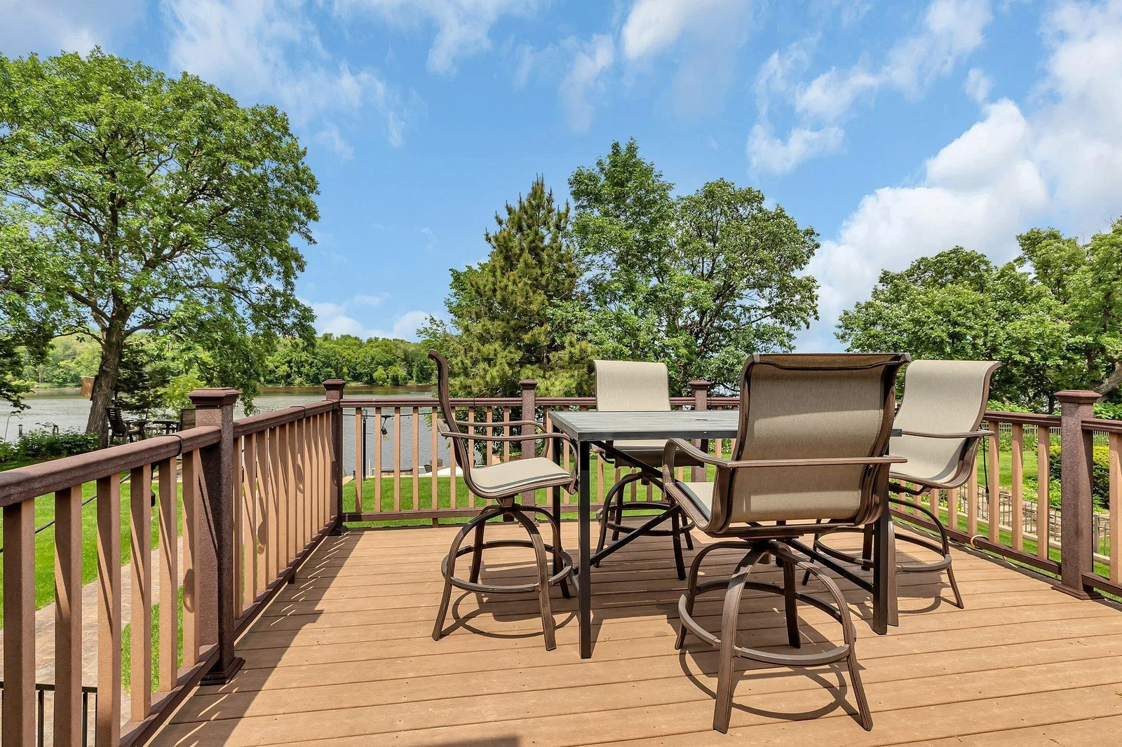 Deck overlooking the river and backyard.