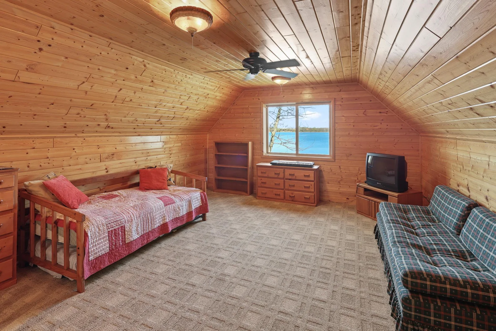 Upstairs bunk room or family room or play room.