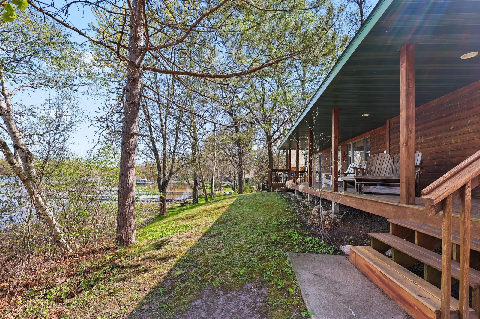 Sweet lakeside covered porch on the main house