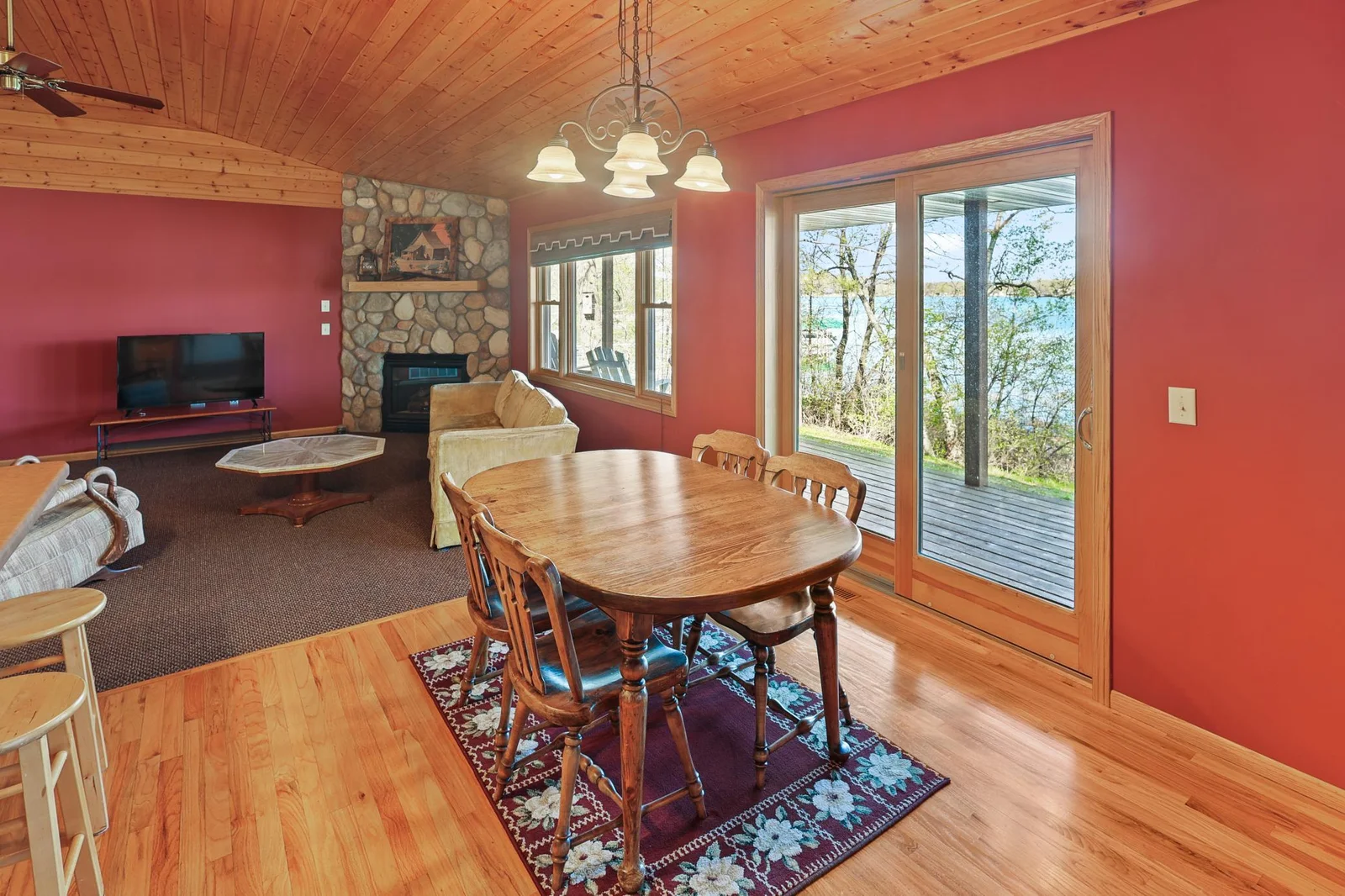 Dining area walks out to covered lakeside porch