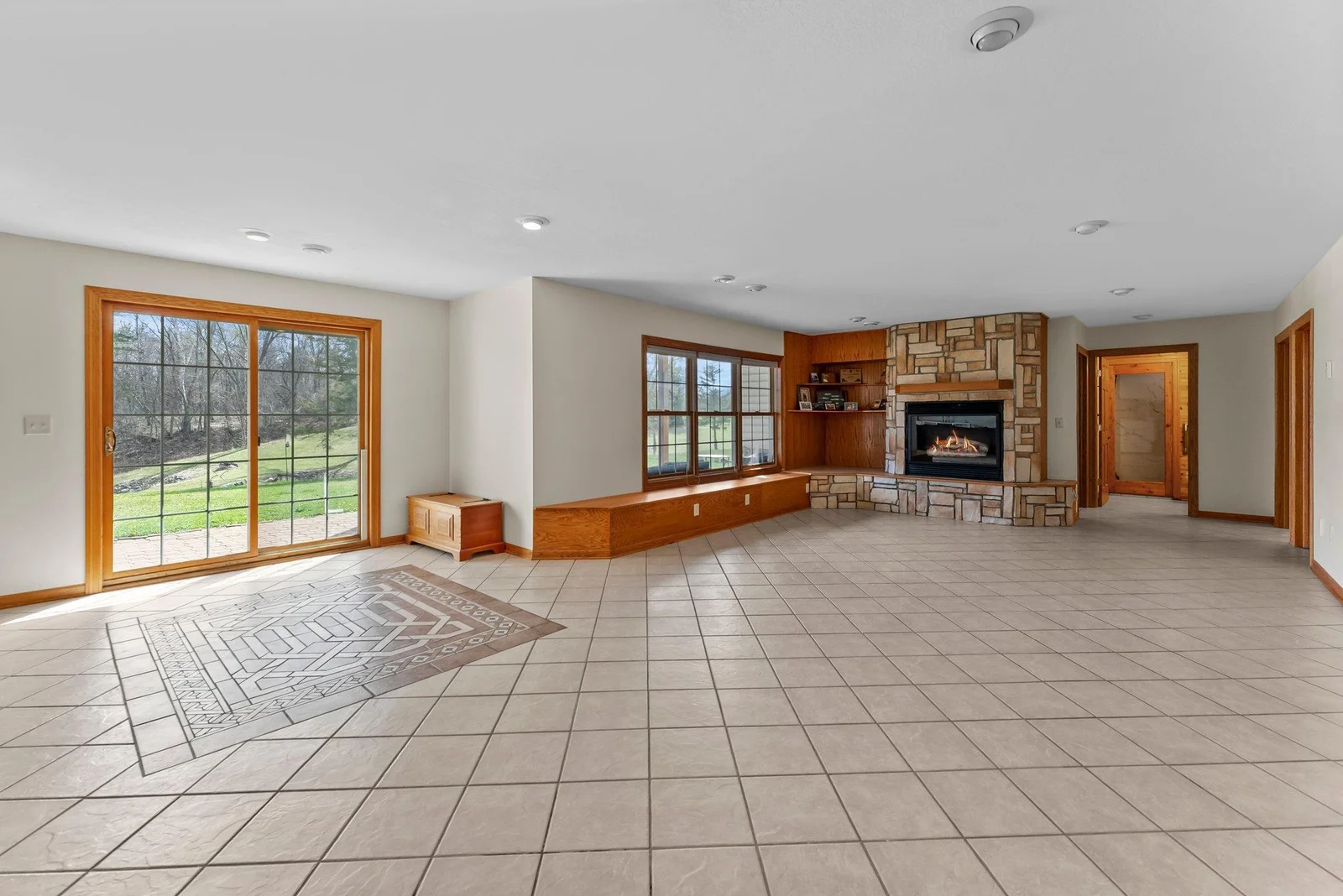 Lower level second family room with fireplace & walk-out to back patio