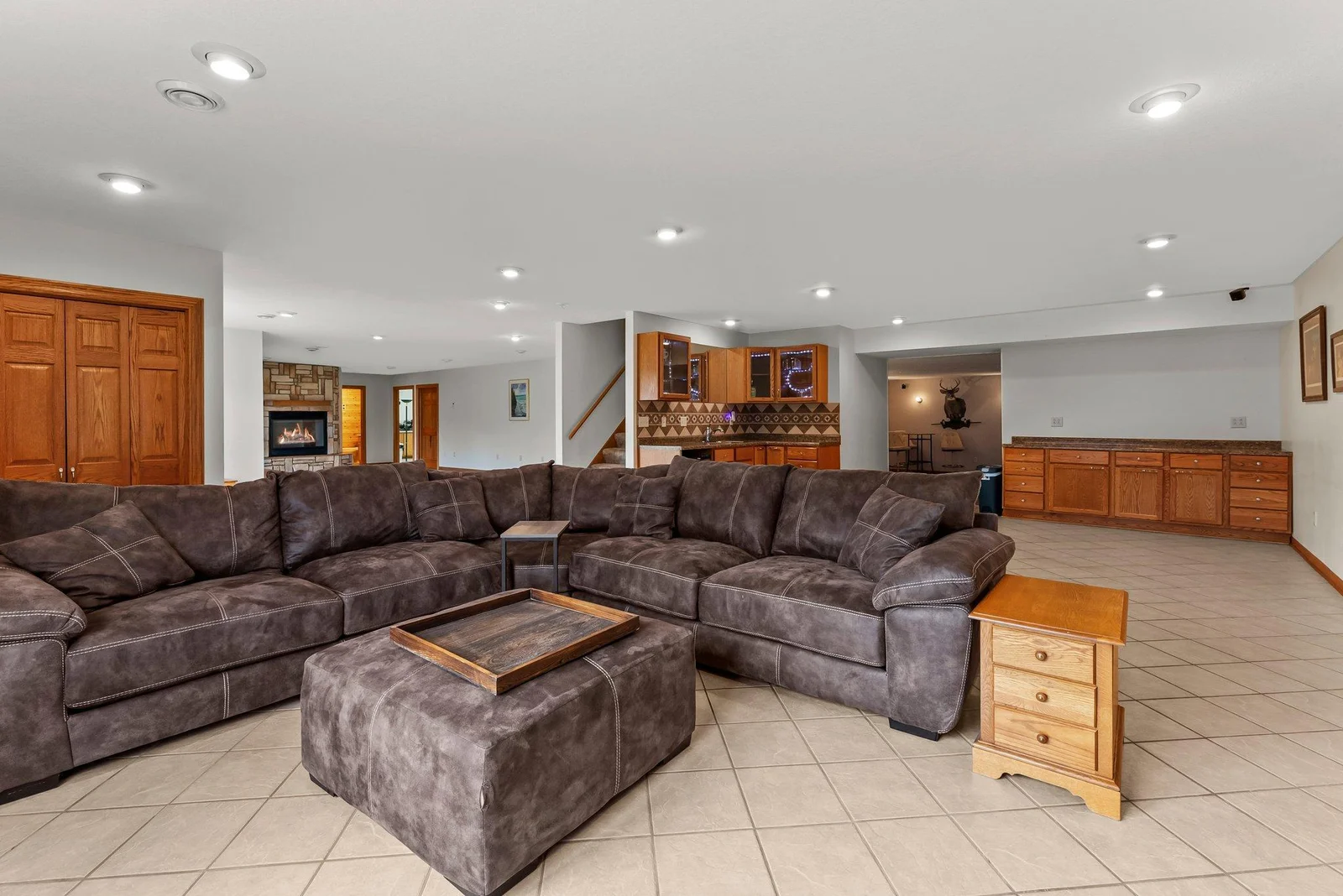 First family room in lower level with entertainment area/wet bar