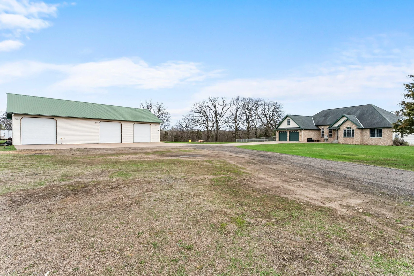 2 car attached garage & detached garage with RV space