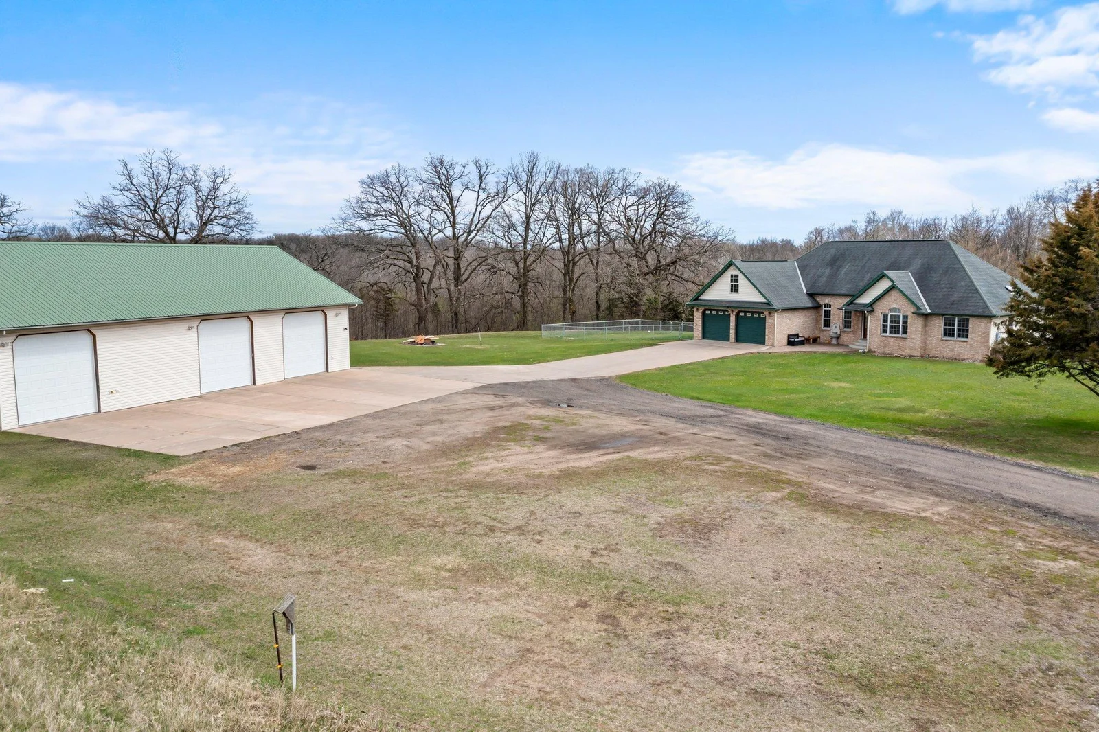 2 car attached garage & detached garage with RV space