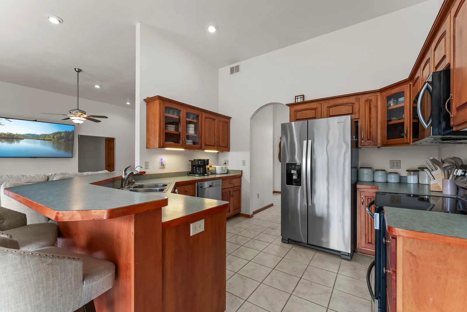 Main level kitchen with buyers able to pick brand new quartz counter-top designs