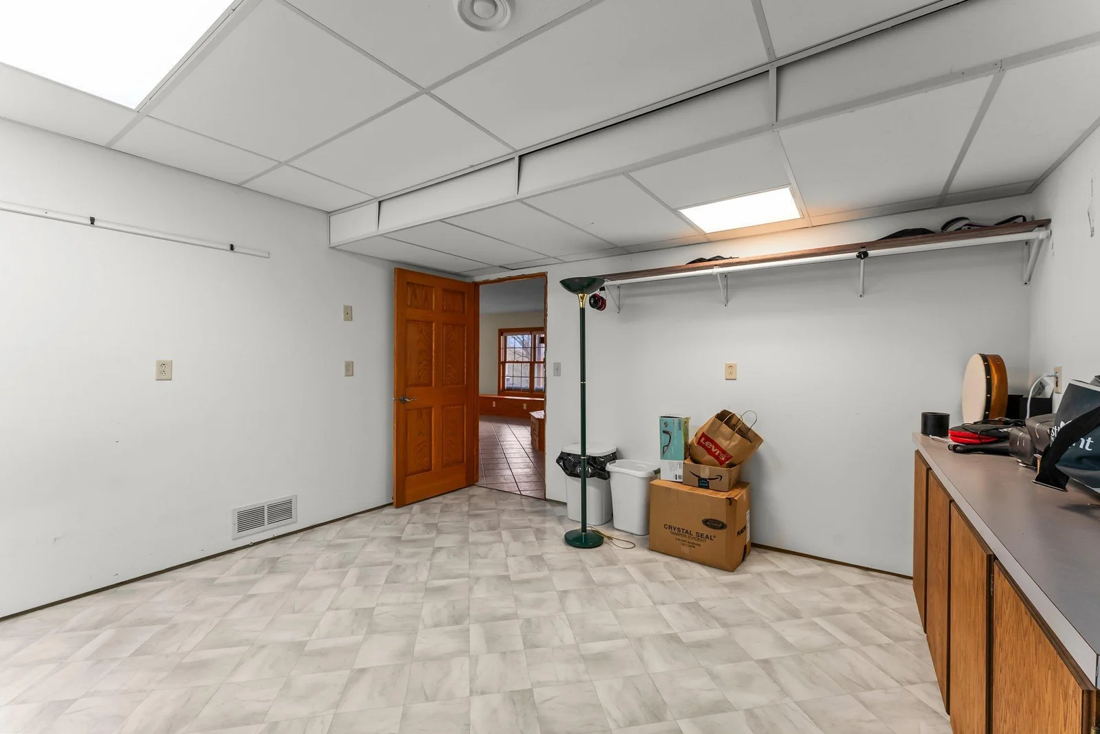 Lower level hobby room/storage room. If you add an egress window this could be a  6th bedroom.
