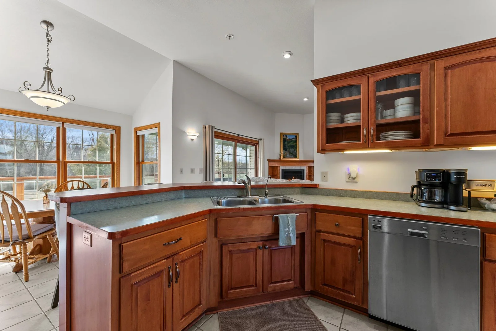Main level kitchen with buyers able to pick brand new quartz counter-top designs