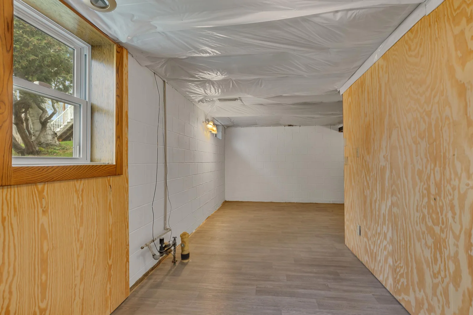 There is some recessed lighting in the lower level and the flooring has been finished.